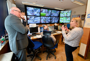 Helen Morgan MP speaking to CCTV co-ordinator Jim Stafford on a visit to Oswestry Police Station