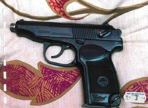 A handgun and silencer discovered by police in a chest of drawers, plus 19 bullets, when searching Eastwood's home on 6 April 2011.