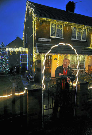 Keith Blackford outside his house