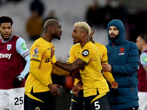 Mario Lemina clashes with team-mate Toti Gomes (Photo by Alex Pantling/Getty Images)