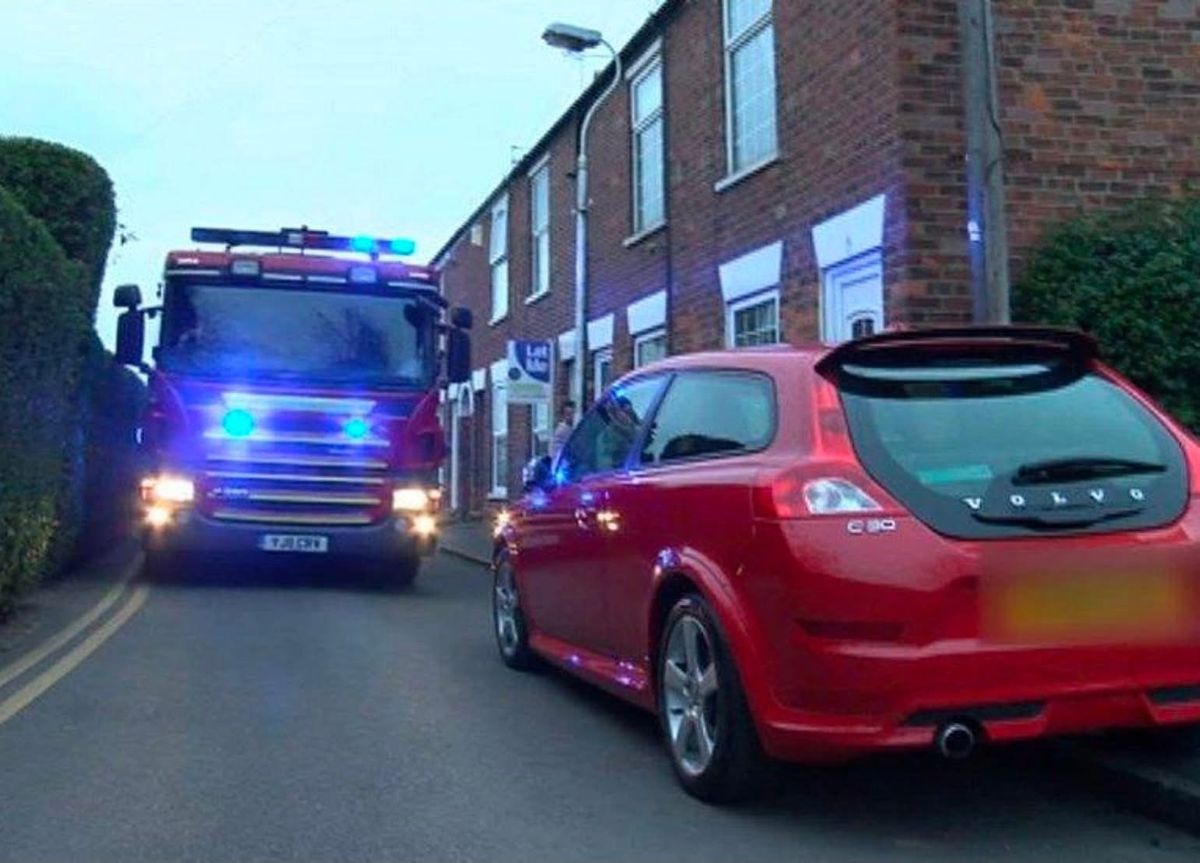 Firefighters in Oswestry plea for motorists not to block roads after struggling to reach flood at house