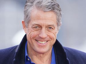 Supporting image for story: Hugh Grant settles claim against Sun publisher due to risk of £10m legal costs