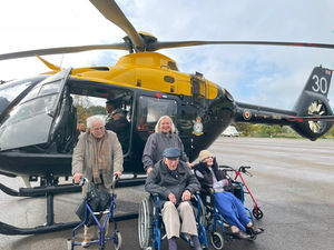 Supporting image for story: Helicopter visit thrills Bluebell View veterans and residents