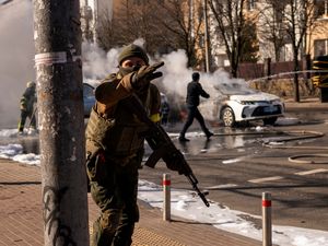 Supporting image for story: Russian troops push toward Ukraine’s capital as residents take cover