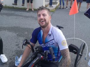 Supporting image for story: Man cycling length of Wales in handbike for local boy with cancer