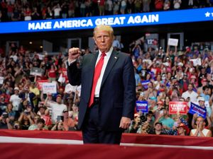 Supporting image for story: Upbeat Donald Trump returns to stage one week after assassination attempt