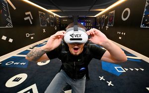 Fun City staff member Taylor Cole tries out a VR game