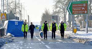 Police at the scene of the collision on the A449 Stafford Road. Photo: Tim Thursfield