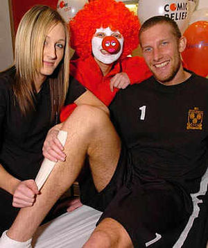 Liza Ward, from Belladonna Beauty, and Kat Sonley, from Fitness First, with Ryan Esson of Shrewsbury Town football club who had his legs waxed in aid of Comic Relief.