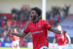 Ellis Harrison celebrates Walsall's opener.