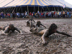 Supporting image for story: Rain pours on Glastonbury...again!