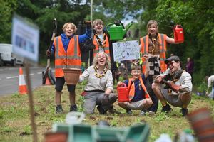 In Albrighton where the community had come together with 1st Albrighton Scouts to plant up a grass verge, making it pretty and more biodiverse. Sally Ginder and Owen Crook with youngsters: Finn 11, Grace 11, Jasper 8, Meg 11.