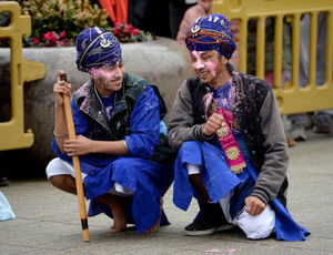 Two Gatka practitioners take a break between matches