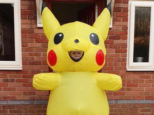 Supporting image for story: Telford boy, aged 11, dressed as huge Pikachu patrols streets to keep spirits high during lockdown
