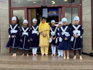 Councillor Parbinder Kaur with dancers at Smethwich Hola Mohalla 