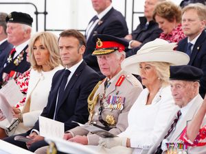French President Emmanuel Macron with wife Brigitte and the King and Queen Royal Navy D-Day veteran Richard Trelease ahead of the UK national commemorative event for the 80th anniversary of D-Day, held at the British Normandy Memorial in Ver-sur-Mer, Normandy, France