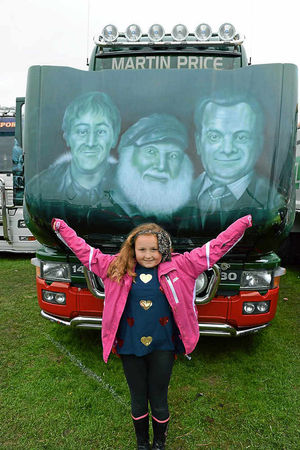 Katey Woodman, nine, with a Scania V8