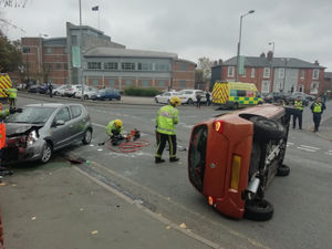 The road was blocked as firefighters recovered the vehicles. Photo: Marcus Burrows
