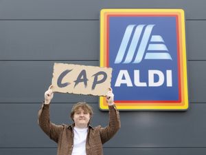 Supporting image for story: Lewis Cap-Aldi surprises shoppers with gig on supermarket roof