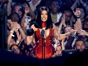 Supporting image for story: Cardi B and husband Offset give each other matching tattoos to mark special date