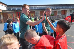 Old Park pupils got a high-five from the Saddlers players during the visit 
