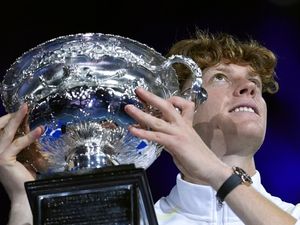 Jannik Sinner holds the Australian Open trophy