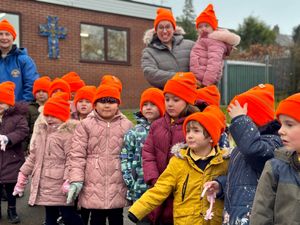 Pupils of Blackshaw Moor First School listening to the gritting crew.