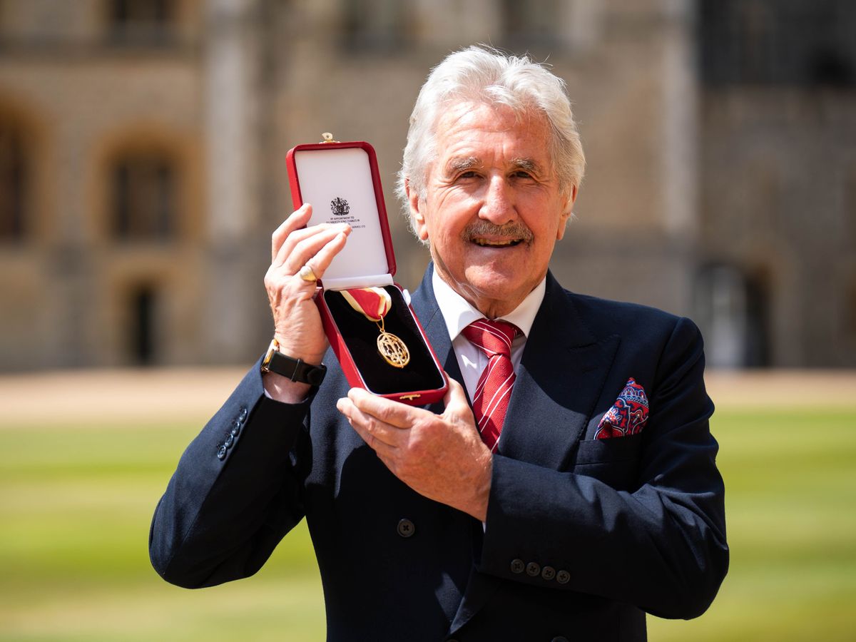 Gerald Davies calls for greater support for volunteers on receiving knighthood