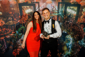 Natasha Blacklock presents a Special Recognition Award to Daniel Skerma