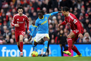 Mateus Mane takes on the Liverpool defence (Photo by Brett Patzke - WWFC/Wolves via Getty Images)