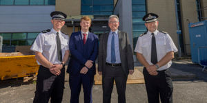 West Midlands Police and Crime Commissioner Simon Foster with police colleagues outside what will be the new Dudley Police HQ
