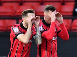 Taylor Allen celebrates another goal with Charlie Lakin.