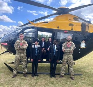  RAF pilots with students Manveet Singh, Aiesha Williams, Elizabeth Selby and Penuel Addoquaye.