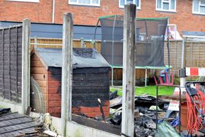 The fire damaged a shed and the back garden fence