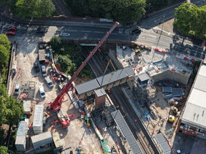 Installation of a pedestrian footbridge at the new Kings Heath railway station. PIC: WMCA