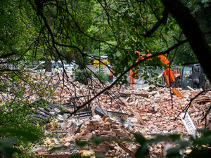 Supporting image for story: Bricks and foundations to remain at Crooked House site to help with council's future investigations