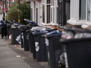 Overflowing bins in the Selly Oak area of Birmingham amid the refuse workers' strike