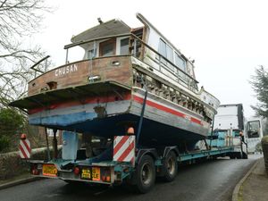 Supporting image for story: Lorry carrying boat gets stuck on bridge near Stafford