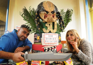 With the cake they produced to mark 30 since Predator, owner Paz Heer, and cakemaker Nune Paruryan at AB Cakes, Wolverhampton.