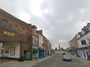 Supporting image for story: Apartment planned for roof space above storage building behind Shrewsbury carpet shop