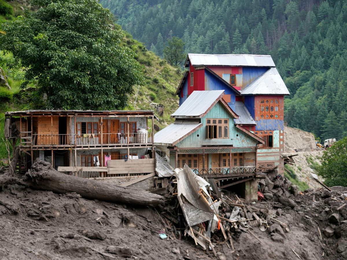 Flash floods triggered by torrential rains kill 120 in India and Pakistan