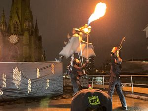 Supporting image for story: I visit Birmingham Light Festival and discover a spine-tingling forest fire, flaming rock music with a giant bat, dazzling love hearts and more