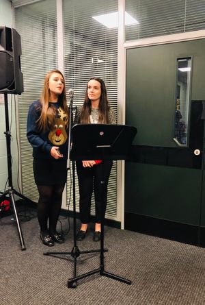 Singers Ellie Cowley and Katie Rabone lending some festive cheer