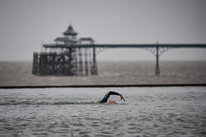 Swimmers at Clevedon Marine Lake, Clevedon, Somerset. Photo: Ben Birchall/PA Wire