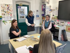 Fern Ardill, aged eight, holds court during a staff meeting at Coleham Primary School, where she was headteacher for the day