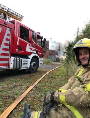 Trevor while out on duty as an on-call firefighter