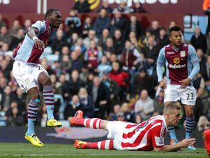 Aston Villa's Christian Benteke (left) scores his teams opening goal