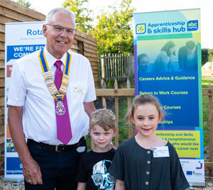 Rotary Club president Dave Simcock with Charlotte and William Titchen