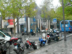 Supporting image for story: Brave Betty keeps on filming as bullets fly