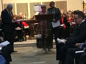 Supporting image for story: Two murdered police officers recalled at dedication of memorial quilt